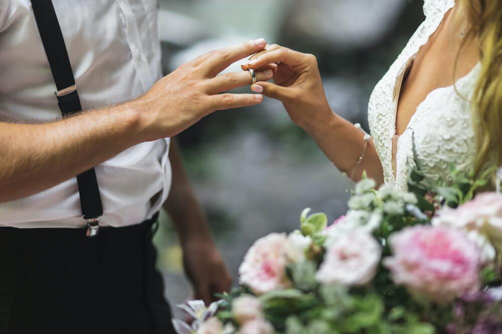 bride and groom making commitment